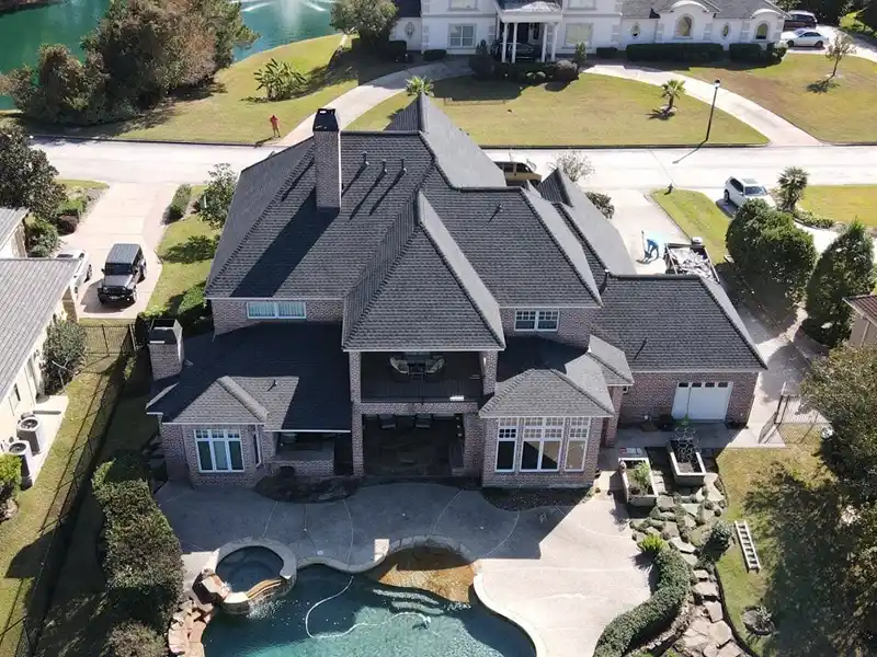 High-end home with new roof shingles
