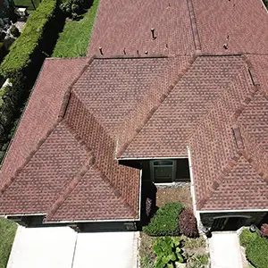 Home with new red shingles