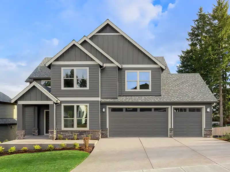 Home with dark gray siding
